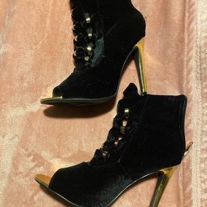 black and gold bootie heels